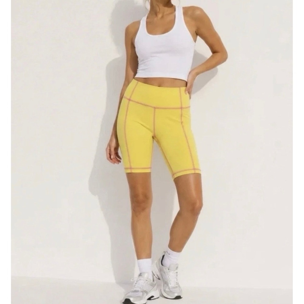 tuckernuck sport yellow pink contrast 7-inch compression bike short, women small